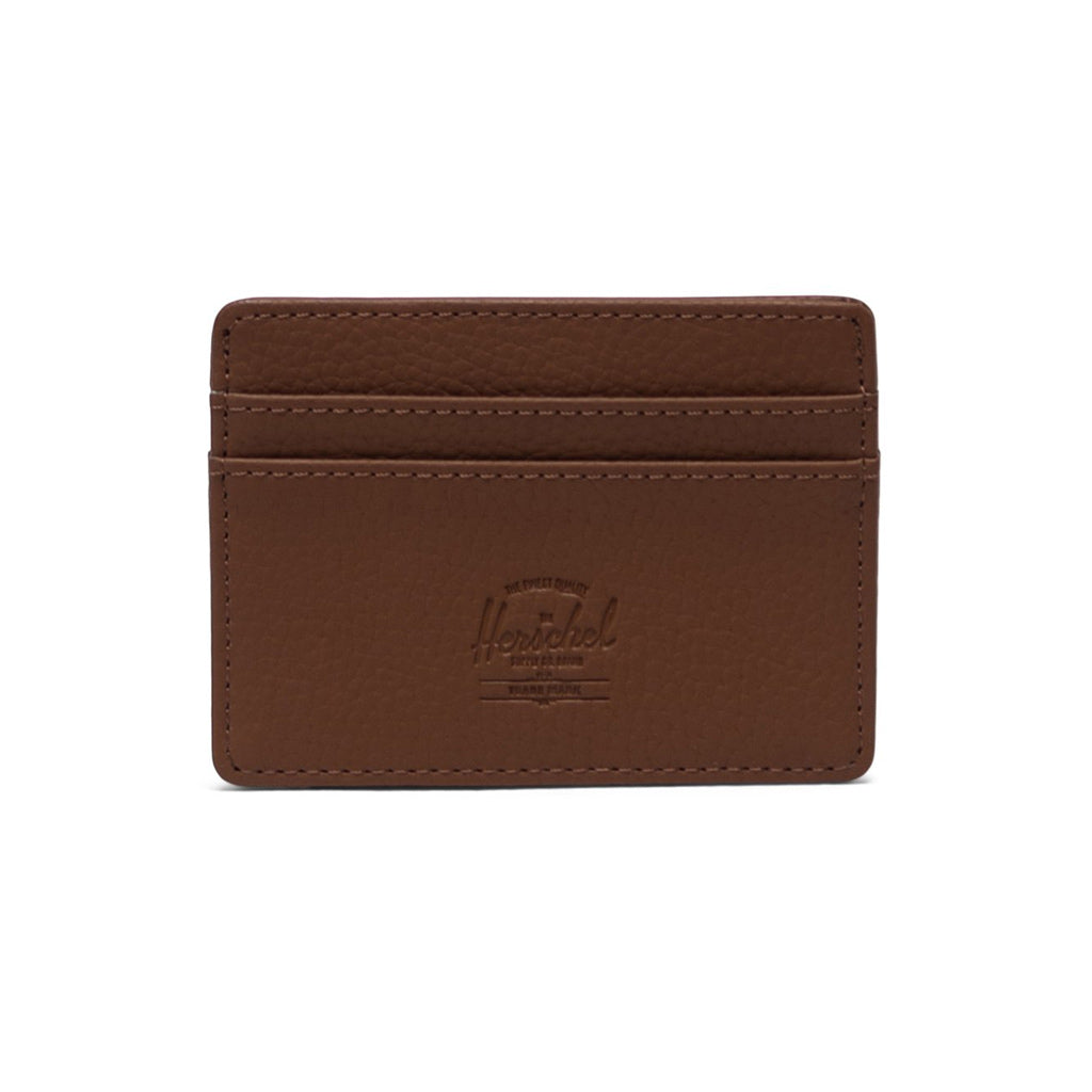 Herschel Charlie Cardholder Vegan Leather - Saddle Brown. Pebbled vegan leather. RFID blocking layer. Multiple card slots. Storage sleeve. Debossed classic logo. Buy Herschel wallets and backpacks online with Pavement and enjoy free NZ shipping on orders over $150.