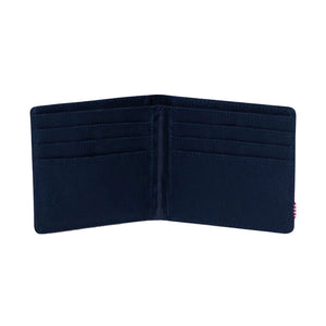 Herschel Roy Wallet - Navy. The classic wallet. The Roy is a folded wallet that opens to feature a currency sleeve and multiple card slots. 9cm (H) x 12cm (W) x 2cm (D). Shop wallets, backpacks and hip packs from Herschel online with Pavement, Dunedin's independent skate store. Free NZ shipping over $150.