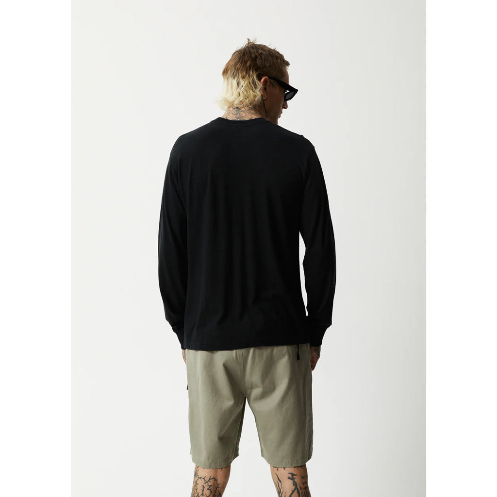 Afends Essential Hemp Retro Long Sleeve Tee - Black. Relaxed Fit. 55% Hemp 45% OCS Certified Organic Cotton Jersey. Lightweight, 170gsm. Shop Afends clothing and accessories with free NZ shipping over $100. Pavement skate store, Dunedin.