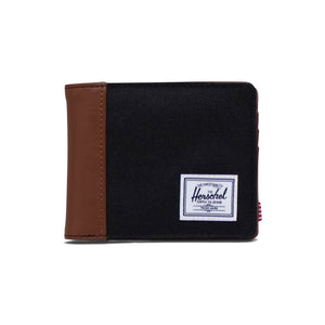 Herschel Hank Wallet - Black Tan - 9cm (H) x 11cm (W) x 1cm (D) EcoSystem™ 600D Fabric made from 100% recycled post-consumer water bottles. Shop Herschel premium wallets and bags online with Pavement skate store, Ōtepoti Dunedin. Free, fast Aotearoa shipping over $150.