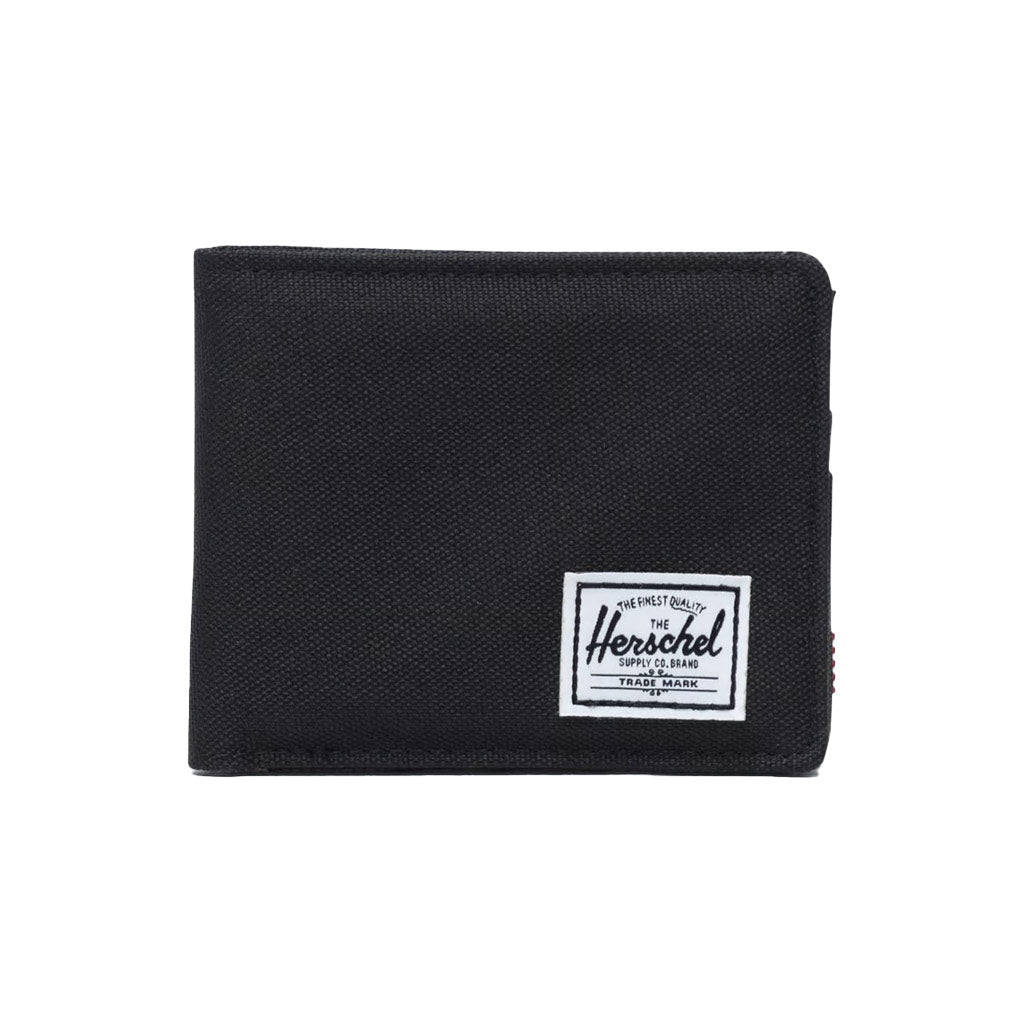 Herschel Roy Wallet - Black. The classic wallet. The Roy is a folded wallet that opens to feature a currency sleeve and multiple card slots. 9cm (H) x 12cm (W) x 2cm (D). Shop wallets, backpacks and hip packs from Herschel online with Pavement, Dunedin's independent skate store. Free NZ shipping over $150.