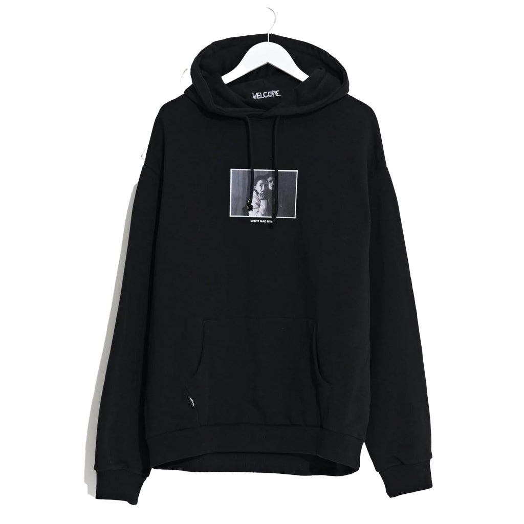 Misfit Brats Hood - Black. 50% Cotton 50% Recycled Cotton Fleece 380gsm. Regular fit hood. Kanga pocket. Finished with rib knit cuffs & hem band & premium trims. Shop Misfit unisex clothing online with Pavement and enjoy free NZ shipping over $150 - Same day Dunedin delivery and easy returns.