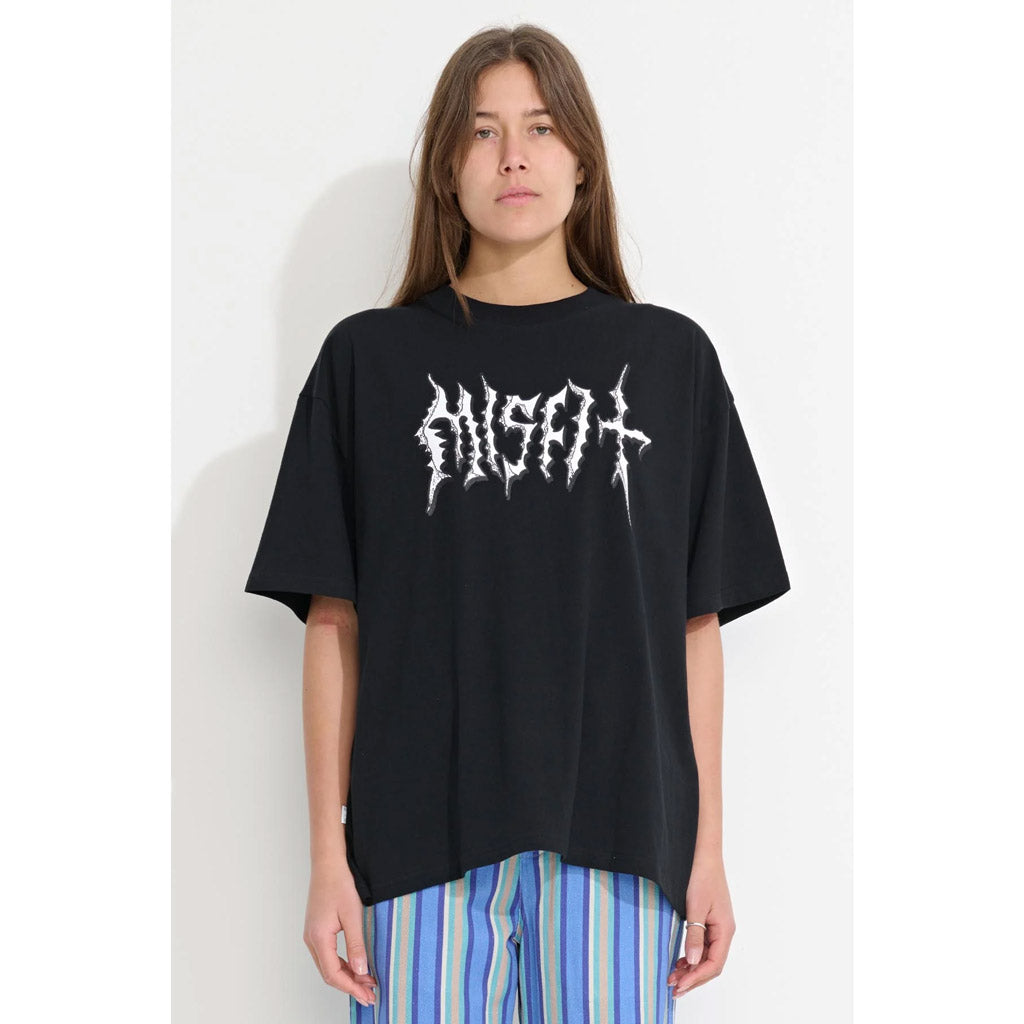 Misfit Hell Corner OS Tee - Black. The Hell Corner Tee in Black is an Oversize tee constructed from 100% cotton jersey, with a 1x1 rib neckband & finished with a front chest print & "Misfit" branded side seam label. Shop Misfit women's clothing online with Pavement. Free NZ shipping over $150 