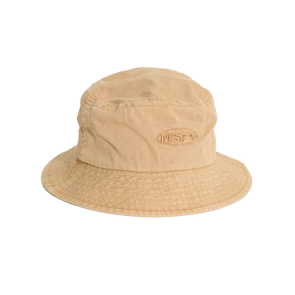Misfit Cereal Storm Bucket - Pigment Faded Tan. 100% Cotton Twill. Featuring woven label at centre front & flag label on brim. Finished with embroidered eyelets at side and a lightweight fusing. 