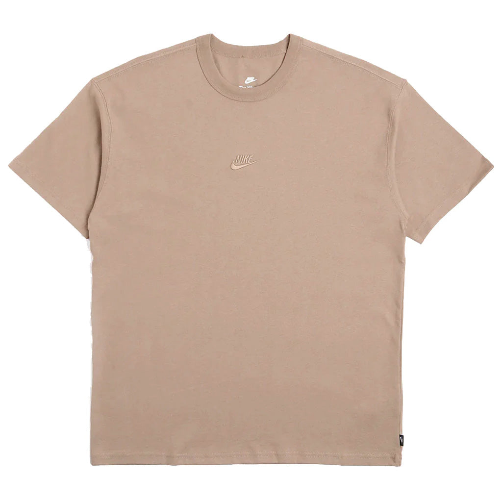 Nike Sportswear Premium Essentials Tee - Khaki. Loose-fitting design features dropped shoulders and room through the chest and shoulders for a relaxed look and feel. Heavyweight cotton jersey has a stiff drape and dry hand for a crisp, thick feel. DO7392-247