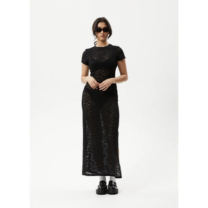 Afends Poet Lace Maxi Dress - Black. Womens Lace Maxi Dress. Stretch Lace. Sheer. T-Shirt Sleeves. Tight fitted - True to size. 90% Recycled Nylon, 10% Spandex Lace. Shop women's Afends clothing online with Pavement and enjoy free NZ shipping over $150, same day Dunedin delivery and easy returns.