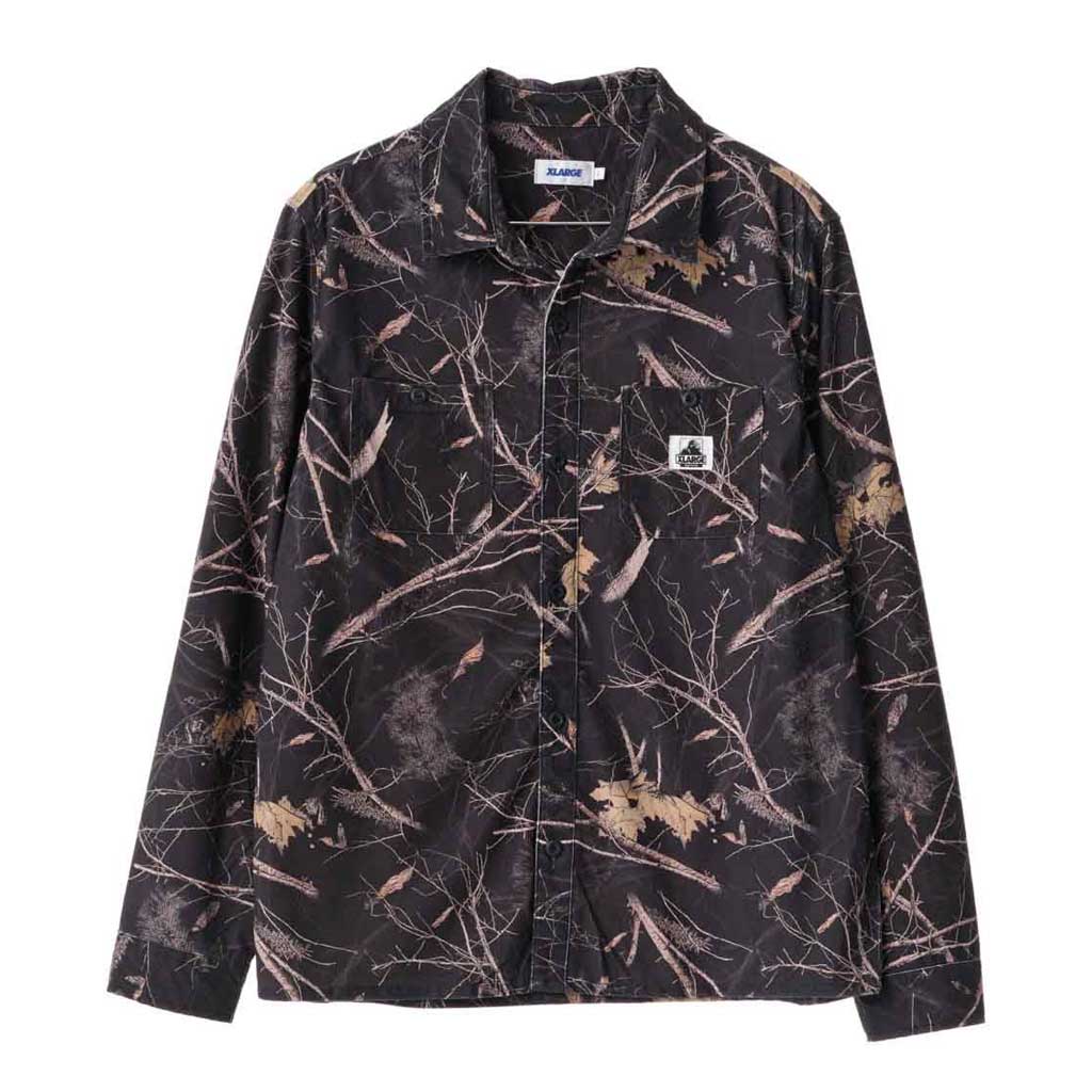 Shop XLarge Cord Authentic LS Work Shirt - Dark Camo online with Pavement skate store. The Cord Authentic Work Shirt in Dark Camo is a box-fit traditional long sleeve shirt. Woven label on chest pocket. Dual chest pockets. Back shoulder yoke. Heavy garment wash. Tonal buttons. Straight hem. 100% Yardage Polyester. 