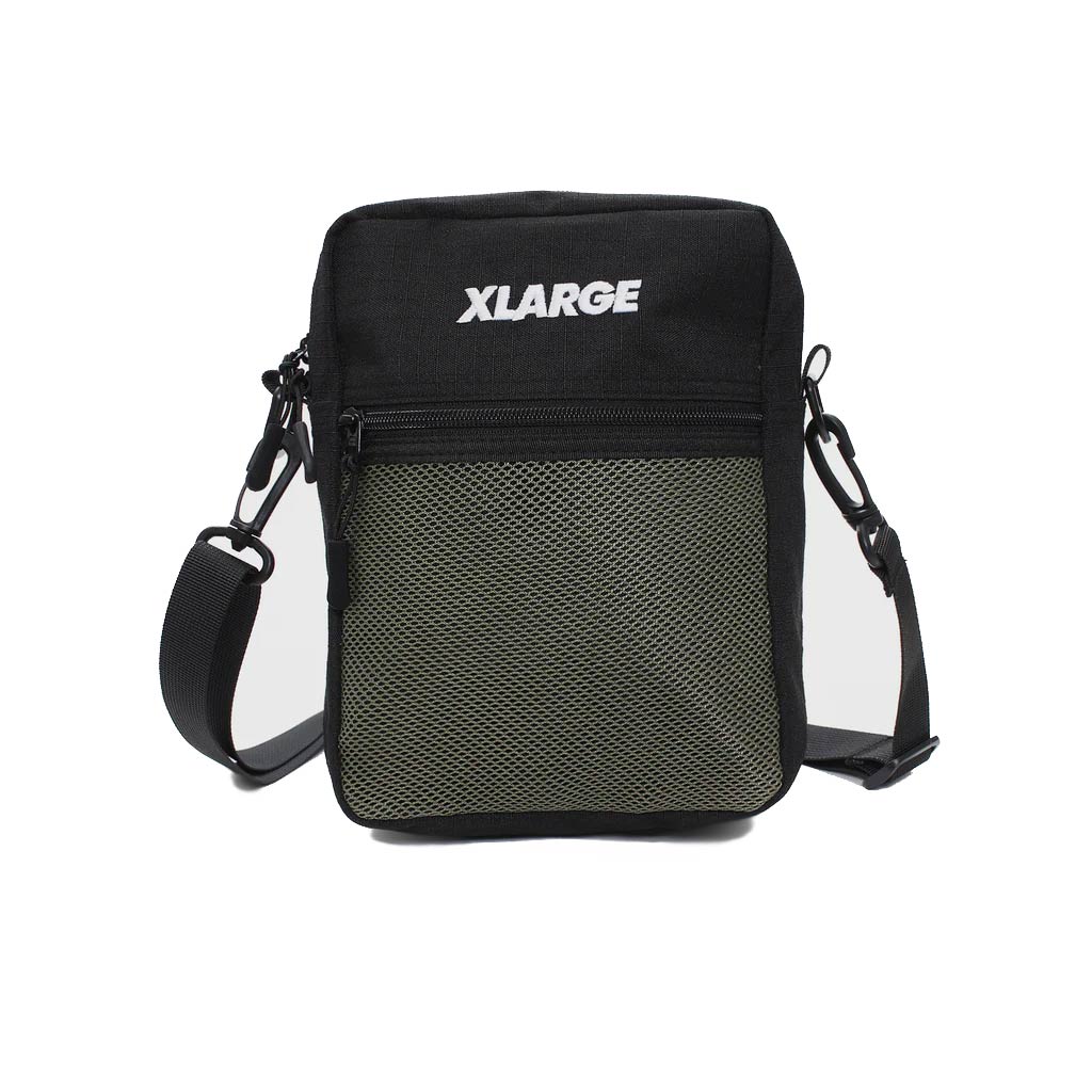 XLarge Ascend Utility Bag - Black. 100% Nylon. Adjustable strap. Small front mesh zipper compartment. Main zipper compartment with small inner button clasp compartment.  L: 20cm, H: 24cm, W: 5cm. Shop bags from XLarge, Dickies, Carhartt WIP. Fast NZ shipping. Same day delivery Dunedin. Pavement skate shop, Dunedin.