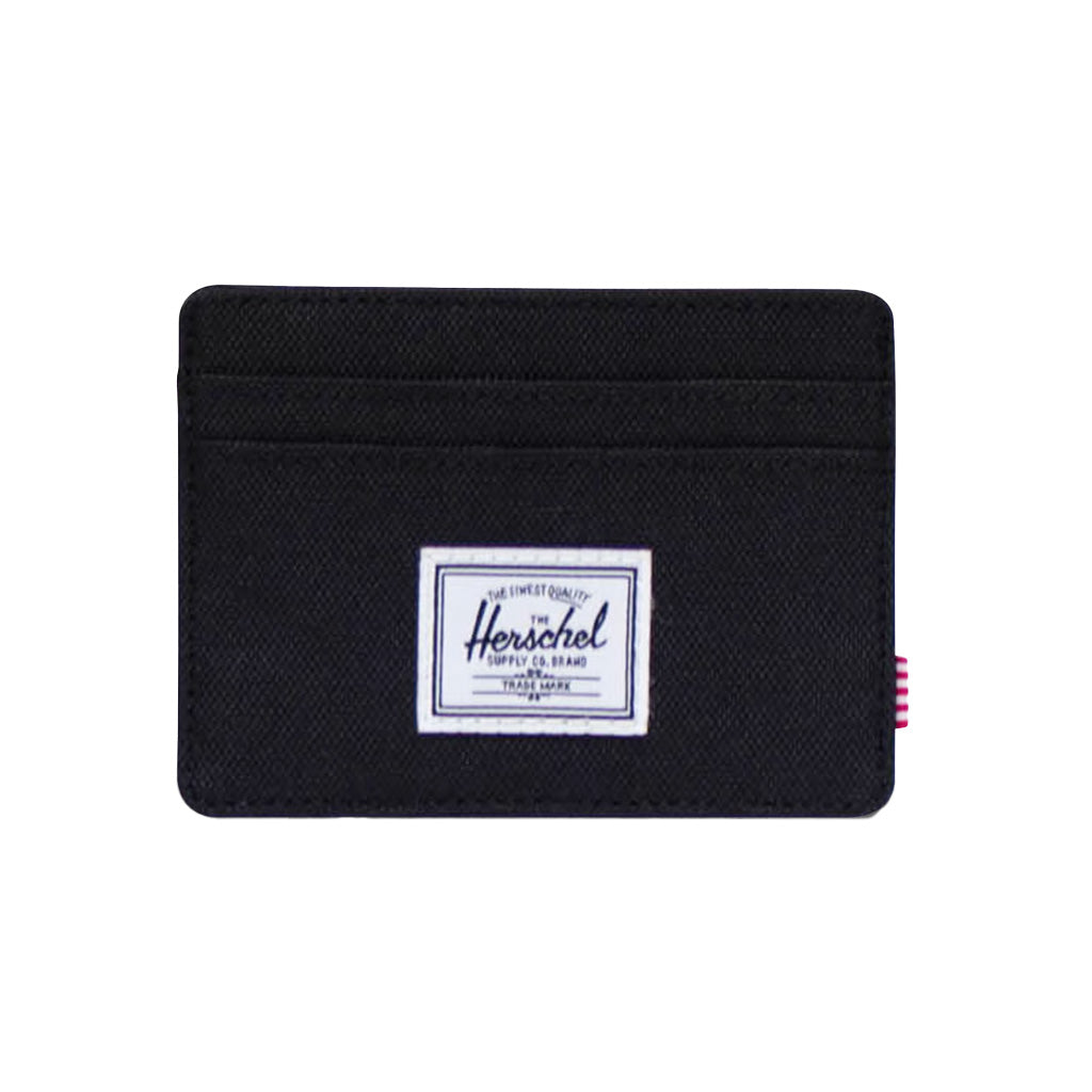Herschel Charlie Cardholder - Black. Slim and simple. Transit pass, bank cards, ID — when that's all you need, it goes here. EcoSystem™ 600D Fabric made from 100% recycled post-consumer water bottles. Comes with Herschel Lifetime Warranty. Free NZ shipping on Herschel orders over $150. Fuss free returns with Pavement.
