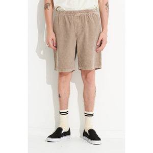 Misfit Cord Beach Metal 20" Short - Pigment Mushroom. Elasticated waist, drawcord, front in-seam pockets, back yoke, back patch pocket with woven label. Constructed from a wide wale cotton cord & finished with premium trims.