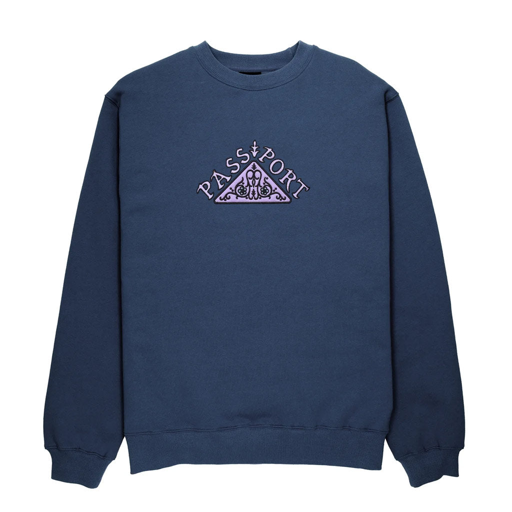 Passport Manuscript Sweater - Navy. Embroidery applique on front. Relaxed fit. Cuffed waist and sleeves. 70% Cotton / 30% Polyester. Free NZ shipping. Shop Pass~Port skateboard decks and apparel with Pavement online.