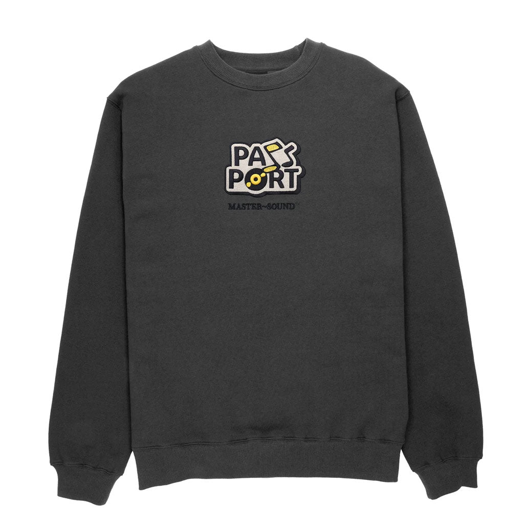 Passport Master Sound Embroidered Sweater - Tar. Embroidery on front. Relaxed fit. Cuffed waist and sleeves. 70% Cotton / 30% Polyester. Free NZ shipping. Shop Pass~Port clothing and skateboards with Pavement online.