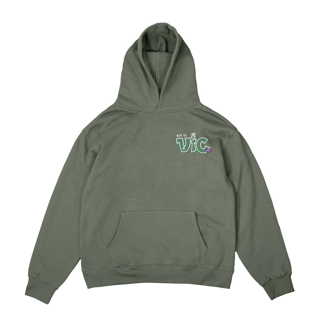 VIC Doodle Hood - Cypress. Relaxed fit. Dropped shoulder. Mid-weight, 320 GSM 80% Cotton 20% recycled polyester anti-pill fleece. Printed graphic at front.  Pavement skate store, Dunedin.