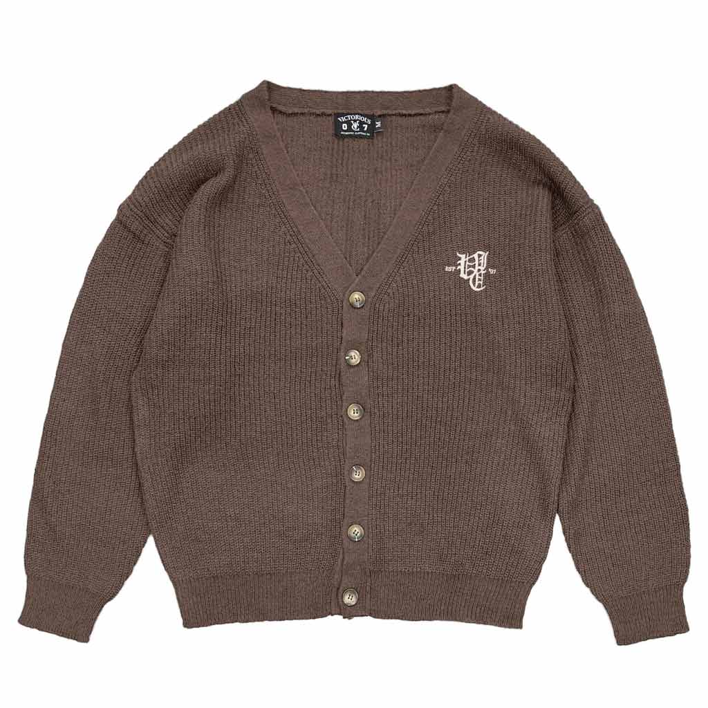 VIC Ol' English Mohair Blend Cardigan - Chocolate. Oversized relaxed fit. V-neck. Dropped shoulders. Soft wool/mohair blend. Embroidered logo. Shop men's knitwear from VIC Apparel online with Pavement skate store, Dunedin. Free NZ shipping over $150 - Same day Dunedin delivery - Easy returns.