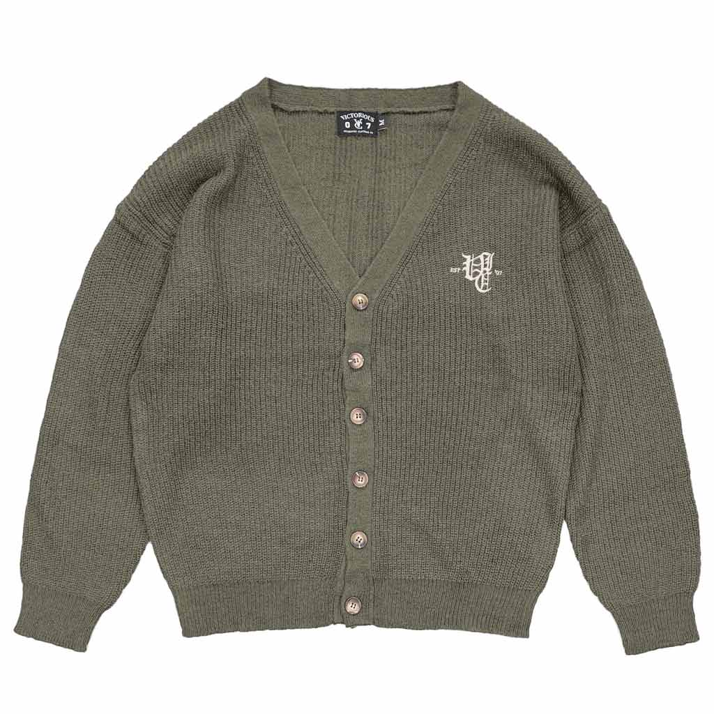 VIC Ol' English Mohair Blend Cardigan - Olive. Oversized relaxed fit. V-neck. Dropped shoulders. Soft wool/mohair blend. Embroidered logo. Shop men's knitwear from VIC Apparel online with Pavement skate store, Dunedin. Free NZ shipping over $150 - Same day Dunedin delivery - Easy returns.