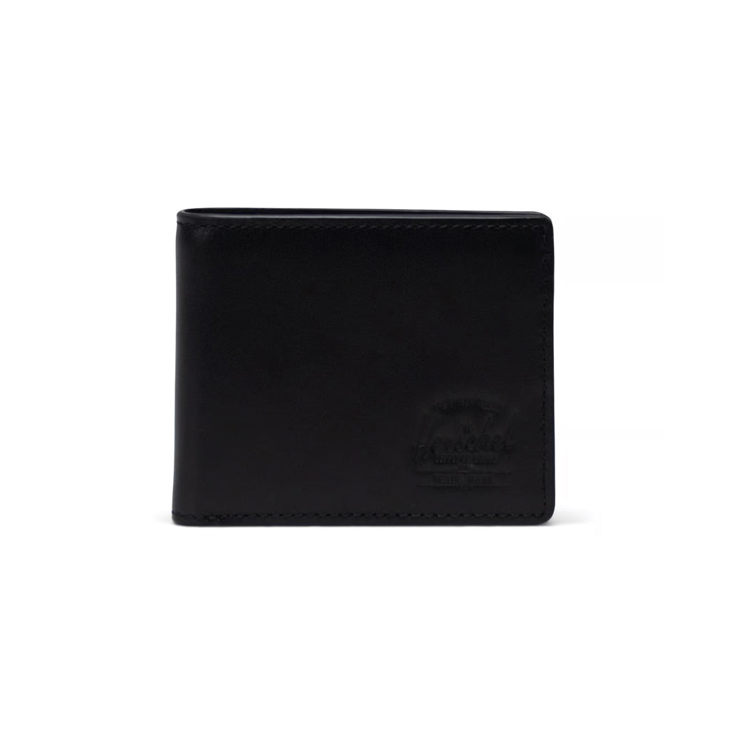 Herschel Hank Leather RFID Wallet - Black. The bi-fold Hank wallet features multiple storage options and a mesh identification window. Smooth leather with hand-painted edges. Signature striped liner RFID blocking layer. Shop wallets online with Pavement and enjoy free NZ shipping over $150. Easy, no fuss returns.