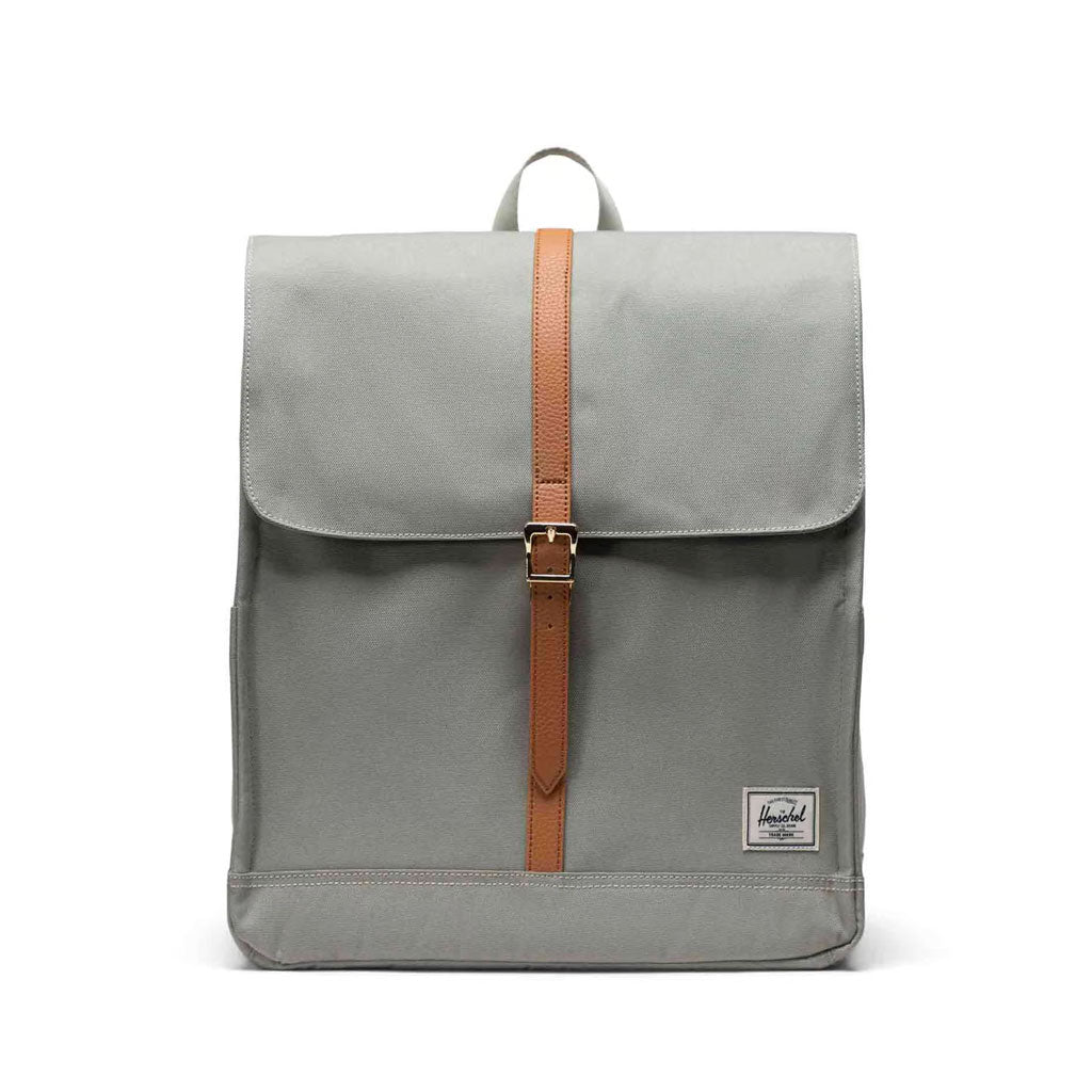 Herschel City Backpack - Seagrass/White Stitch. 16L 37cm (H) x 33cm (W) x 15cm (D). EcoSystem™ 600D Fabric made from 100% recycled post-consumer water bottles. Padded floating sleeve fits a 15"/16" laptop. Magnet fastened strap closure with metal pin buckle. Shop Herschel backpacks online with Pavement.