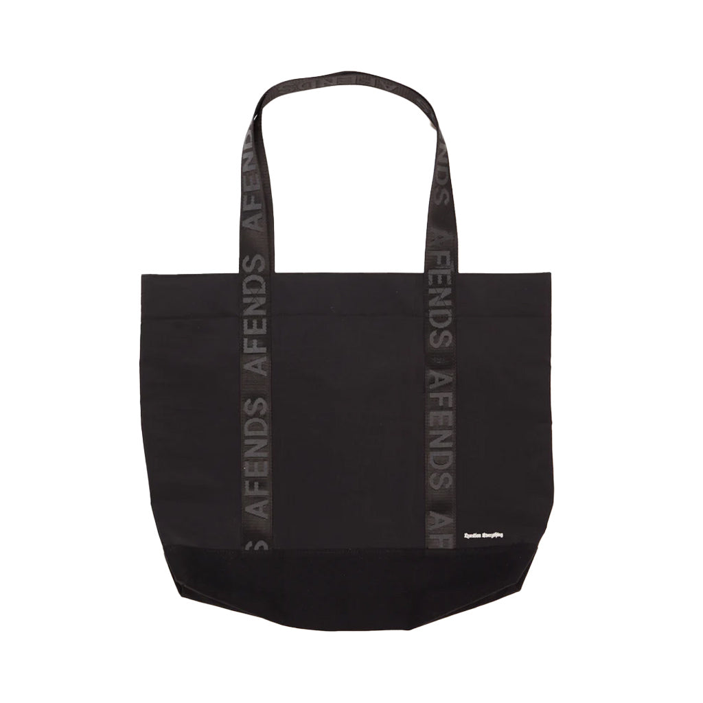 Afends Outline Oversized Tote Bag - Black. Large Tote Bag. Contrasting Shoulder Straps. Long-Lasting Wear.  100% Recycled Nylon Taslon, 101gsm. Shop Afends online with Pavement skate store and enjoy free NZ shipping over $150, same day Dunedin delivery and easy returns.