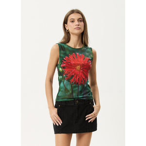 Woman wearing a sleeveless top with a red floral design on a white background | Afends Open Up Sheer Tank - Multi | Free Aotearoa NZ shipping on your Afends orders over $100* when you shop with Pavement Skate Store!