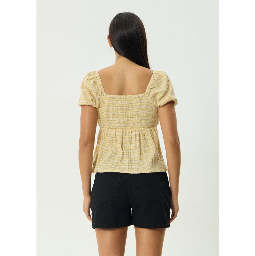 Afends Sunday Seersucker Top in Lemon Check | Shop Afends with Pavement online and recieved free Aotearoa NZ shipping on orders over $100*!