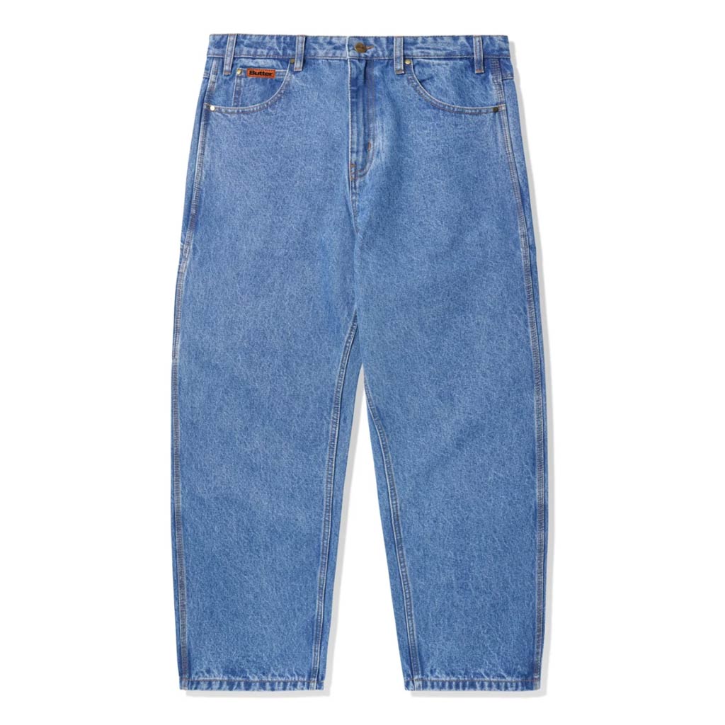 Butter Goods Baggy Denim Jeans - Washed Indigo. 100% Cotton relaxed fit denim jeans. Contrast gold stitching. Woven label on coin pocket & back pocket. Shop Butter denim jeans and shorts with Pavement skate store online. Free, fast NZ shipping over $150.