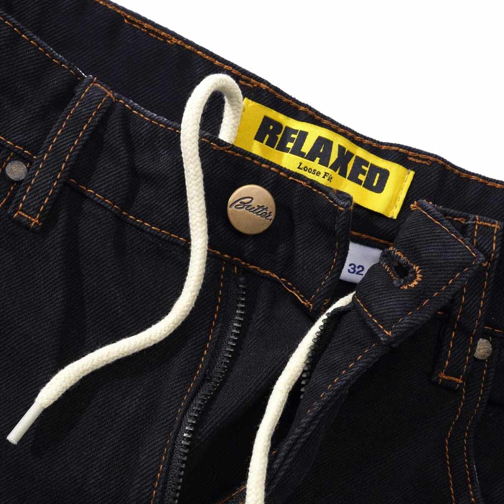 Butter Goods Relaxed Denim Jeans in Washed Black. Shop premium Butter Goods clothing online with Pavement Skate Store. Free Aotearoa NZ shipping over $100*