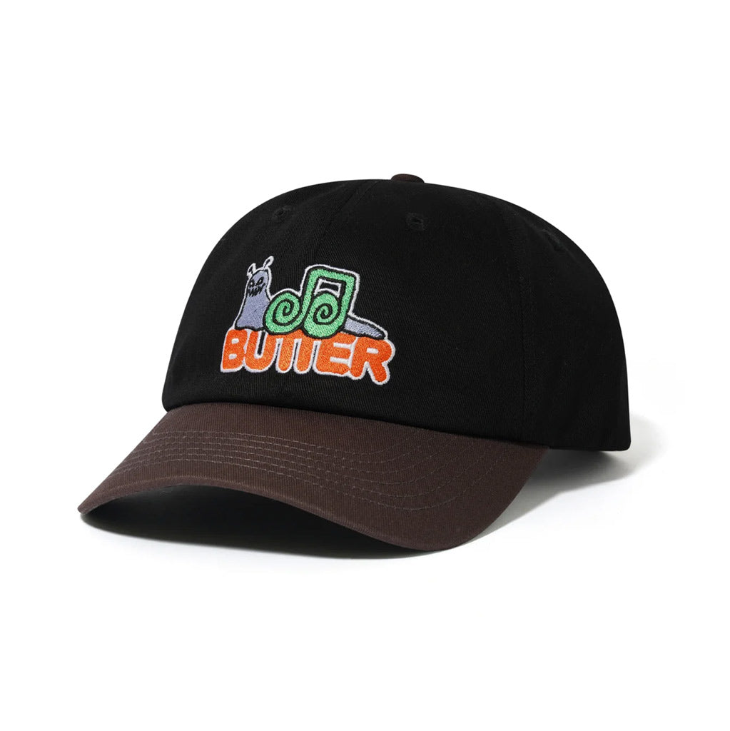 Butter Goods Snail 6 Panel Cap - Black/Dusk | Shop Butter Goods online with Pavement Skate Store and enjoy free Aotearoa shipping on orders over $100*!