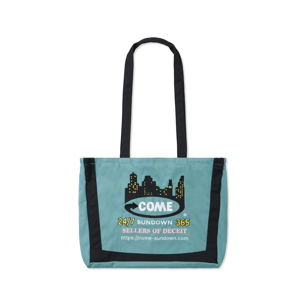 Come Sundown Deceit Shoulder Bag - Algae. 100% Cotton Canvas. Zipper Close. Embroidered front and back. Internal zip pocket. 50 x 38cm. Shop Come Sundown with Pavement online. Free, fast NZ shipping over $150. Easy, no fuss returns.