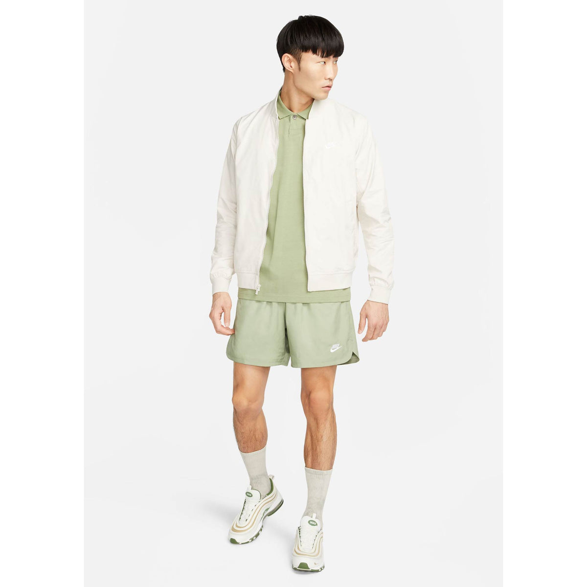Nike Woven Lined Flow Shorts - Oil Green/White. 100% polyester main & lining Mesh lined Elastic waistband Draw-cord fastening Side entry pockets Nike embroidery Dolphin hem Back flap pocket with key loop Style: DM6829-386.