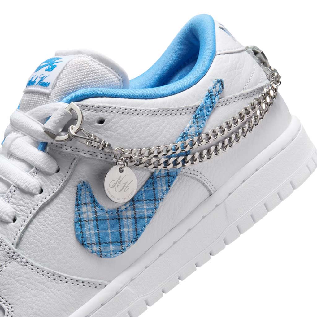 Nike SB Nicole Hause Dunk Low Pro - White/University Blue-White. Playfully off the chain. That's not a paradox, that's Nicole Hause's approach to skateboarding, life and leisure. Style code: FZ8802-100. Free Aotearoa NZ shipping when you order online with Pavement Skate Store.