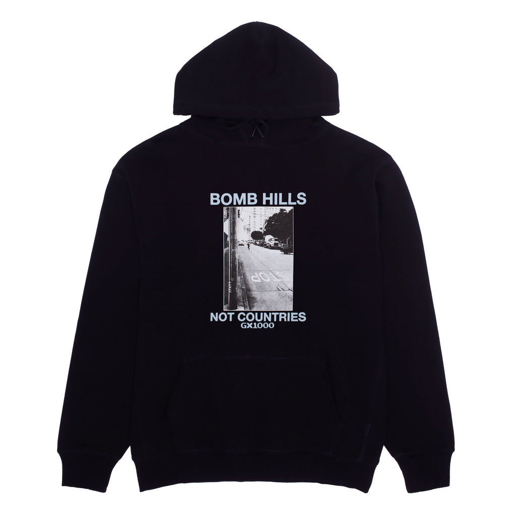 GX1000 Bomb Hills Not Countries Hoody - Black/Light Blue. SK8 Fit Hoodie. 10oz Jersey Fleece. Screen Printed. 100% Cotton. Free Aotearoa NZ shipping. Shop GX1000 skateboard decks, clothing and accessories online with Ōtepoti's independent skate store, PAVEMENT.