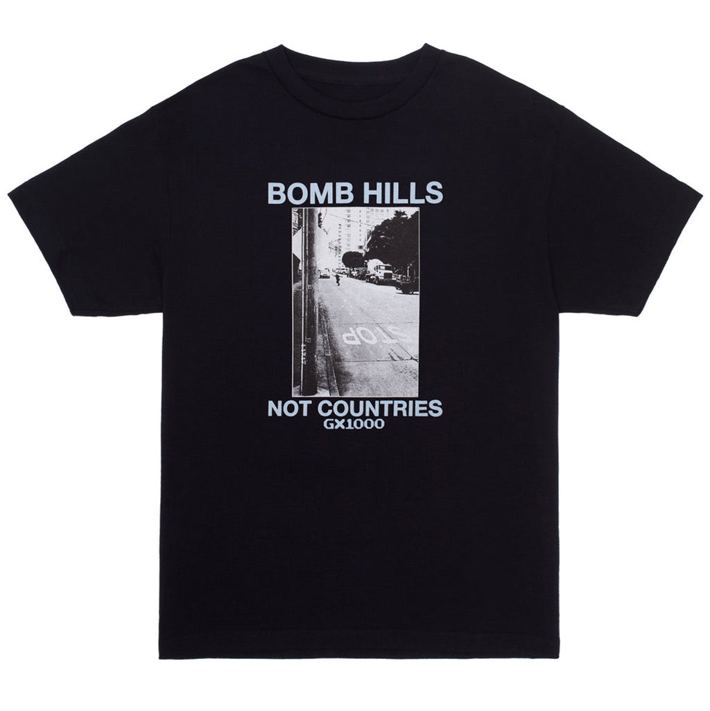 GX1000 Bomb Hills Not Countries Tee - Black/Light Blue. Midweight Tee. 100% Cotton. Shop GX1000 skateboard decks, clothing and accessories online with Pavement, Dunedin's independent skate store est.2009. Free NZ shipping over $150 - Same day Dunedin delivery - Easy returns.