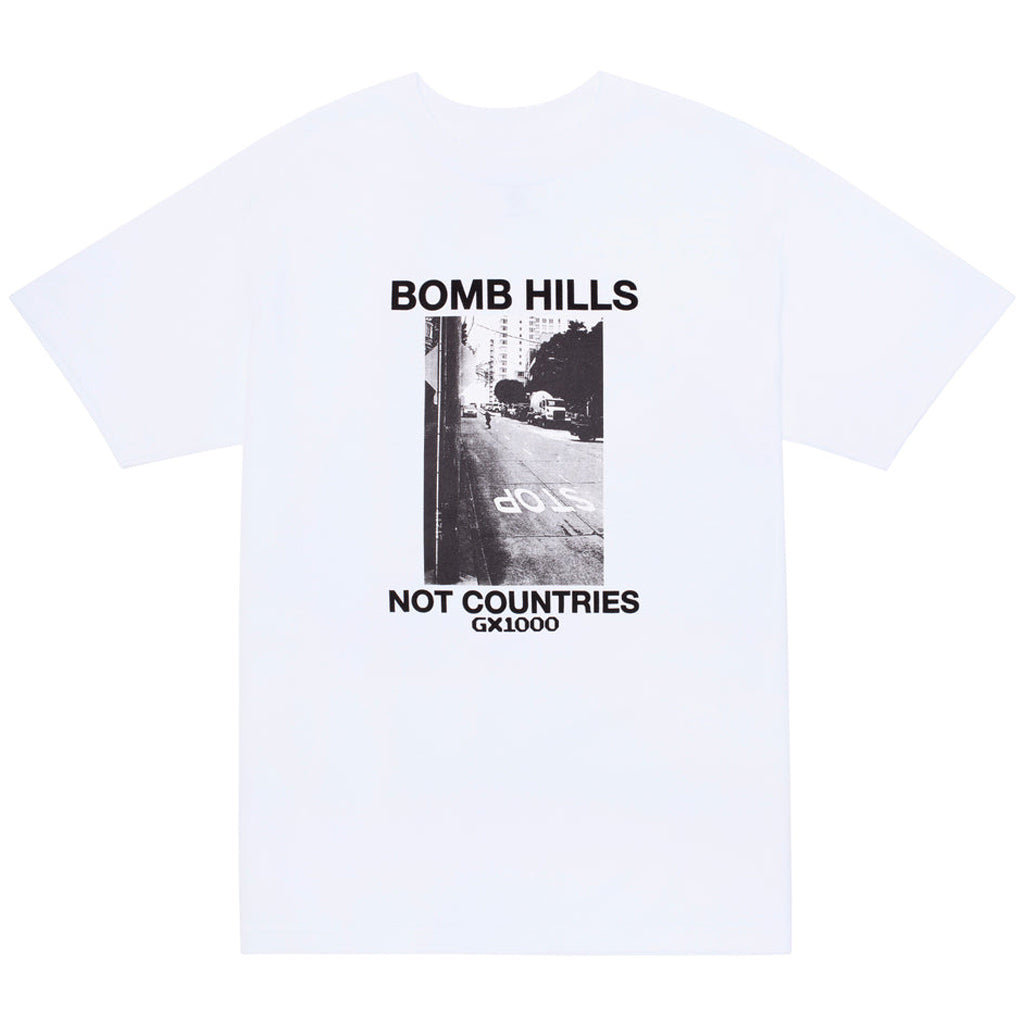 GX1000 Bomb Hills Not Countries Tee - White/Black. Midweight Tee. 100% Cotton. Shop GX1000 skateboard decks and clothing online with Pavement Skate Store! Free Aotearoa NZ shipping over $100*