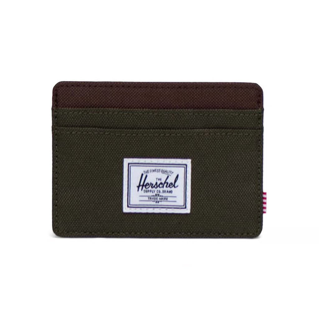 Herschel Charlie Cardholder - Ivy Green/Chicory Coffee. Slim and simple. Transit pass, bank cards, ID — when that's all you need, it goes here. EcoSystem™ 600D Fabric made from 100% recycled post-consumer water bottles. Comes with Herschel Lifetime Warranty. Free NZ shipping on Herschel orders over $150 with Pavement.