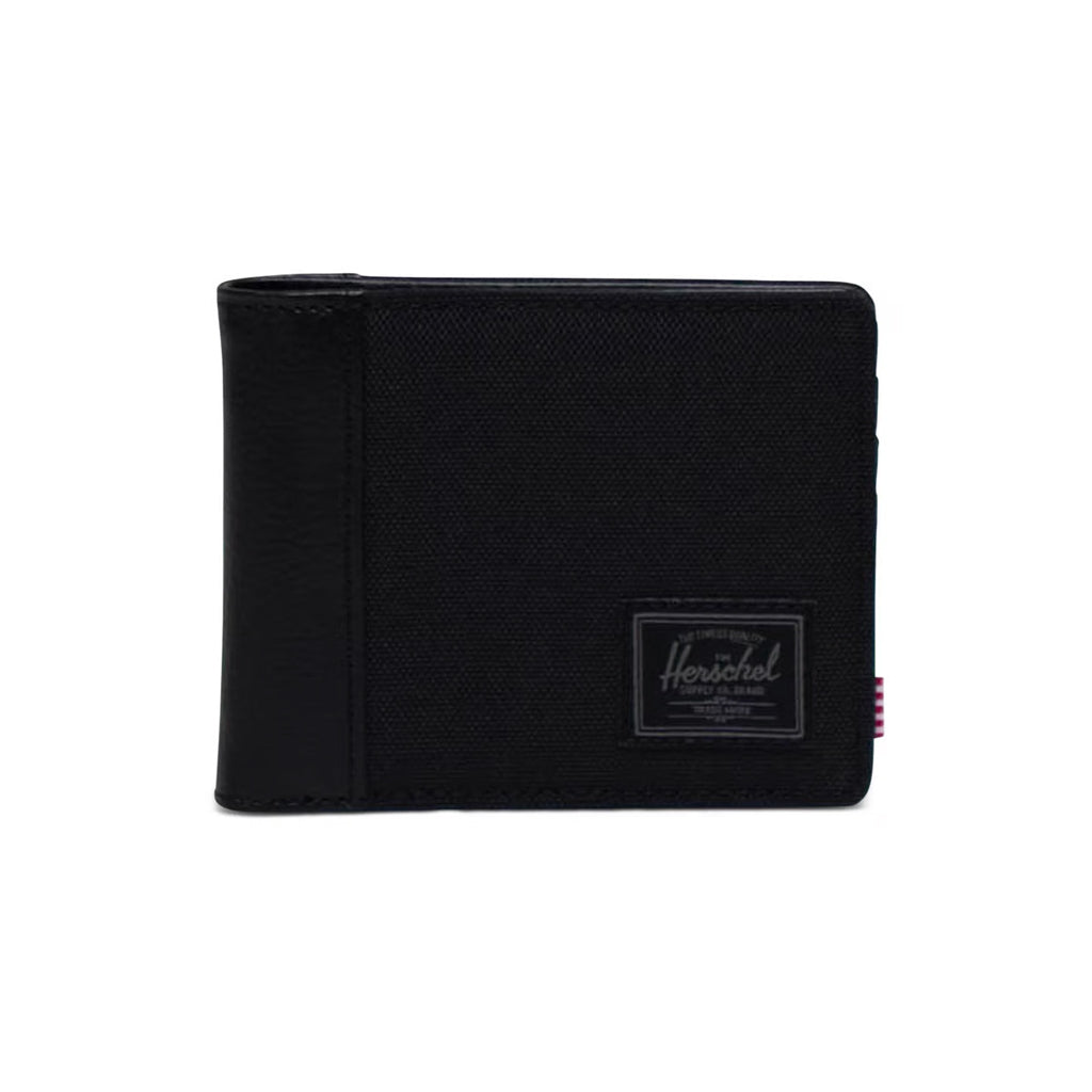 Herschel Hank Wallet - Black Tonal - 9cm (H) x 11cm (W) x 1cm (D) EcoSystem™ 600D Fabric made from 100% recycled post-consumer water bottles. Shop Herschel premium wallets and bags online with Pavement skate store, Ōtepoti Dunedin. Free, fast Aotearoa shipping over $150.