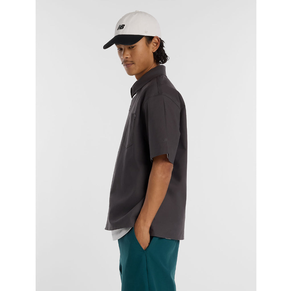 NB Numeric Button Up Shirt in Faded Black | Shop New Balance Numeric clothing online with Pavement Skate Store with free Aotearoa NZ shipping over $100*!