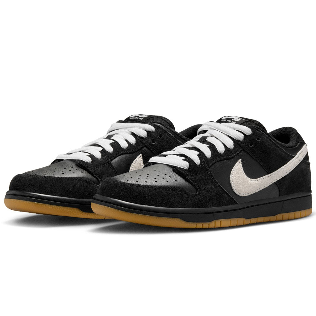 Nike SB Dunk Low Pro - Black/White-Gum Light Brown. Shop Nike Skateboarding from Pavement Skate Shop! Order online and get free shipping on orders over $100*