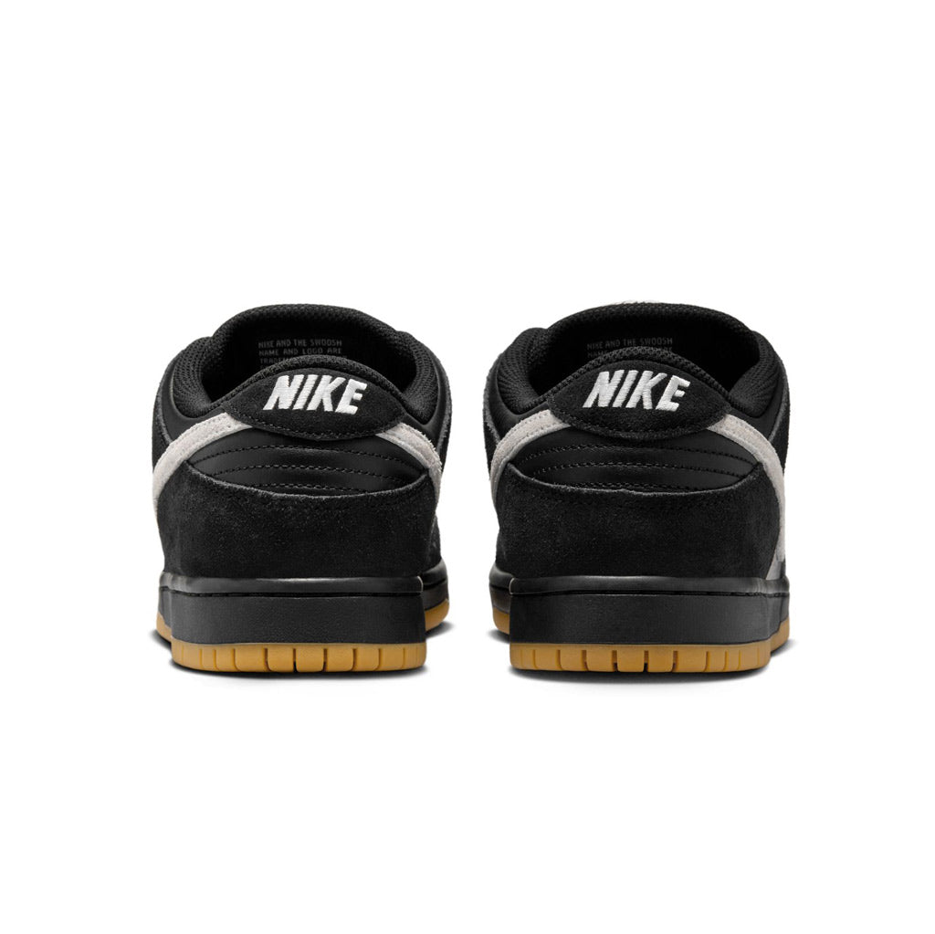 Nike SB Dunk Low Pro - Black/White-Gum Light Brown. Shop Nike Skateboarding from Pavement Skate Shop! Order online and get free shipping on orders over $100*