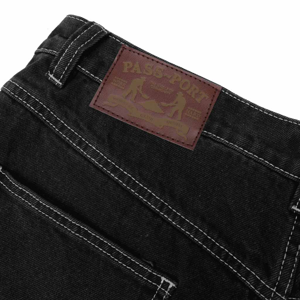 Pass~Port Workers Club Jean - Faded Washed Black. Range #43. 100% Cotton 16oz rigid denim and fine yarn. Triple needle stitch. Silver contrast stitching. Enzyme wash finish. Relaxed straight fit. Shop Pass~Port skateboard decks, clothing and accessories online with Pavement NZ. Free shipping across Aotearoa over $100*