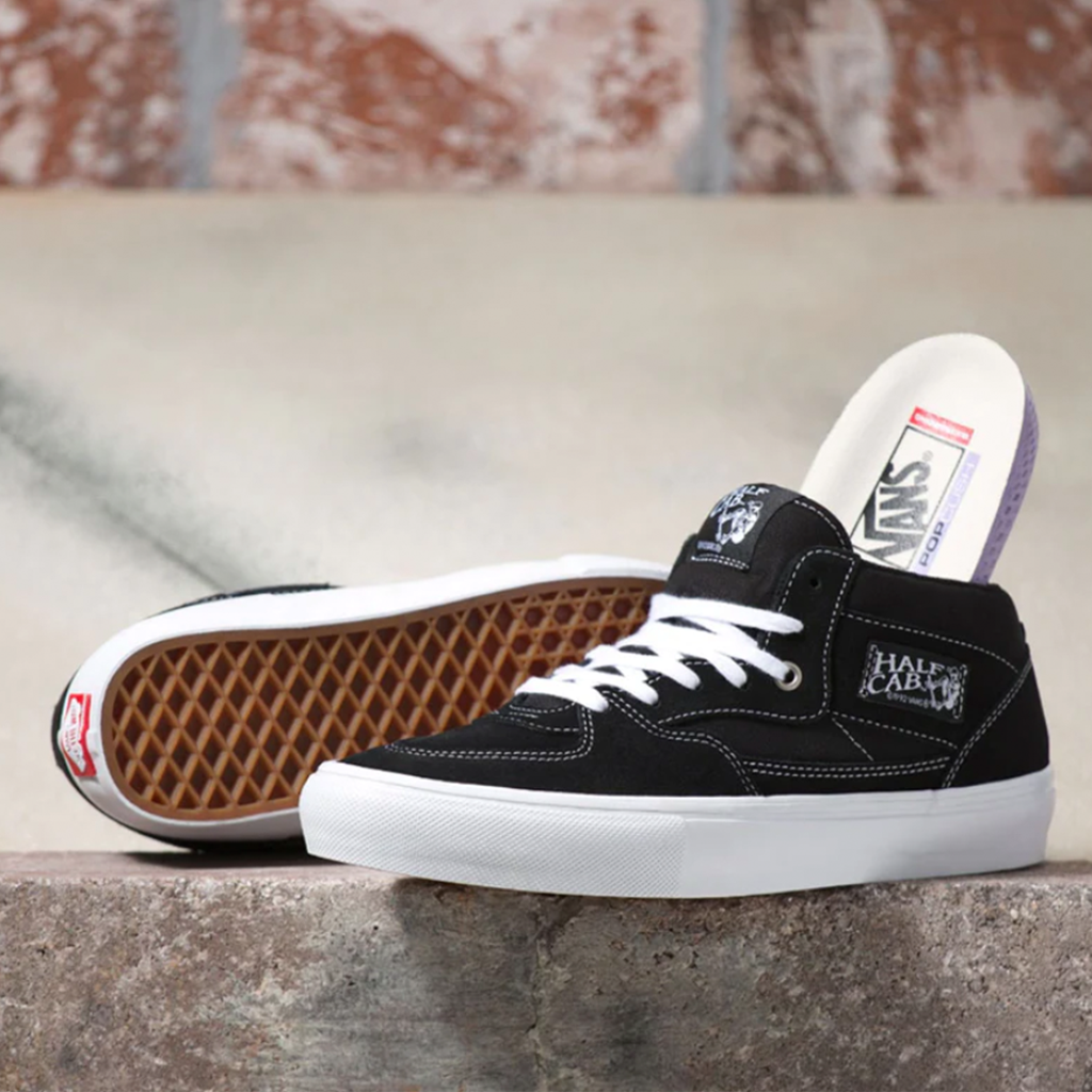 Vans Skate Half Cap  - Black/White. Built Extra Tough on the Inside For Skateboarding. Completely redesigned for modern skateboarding, the all-new Skate Classics collection delivers more of what skateboarders need to enable maximum progression. Free NZ shipping on orders over $100. Pavement, Dunedin's locally owned and operated skate store. 