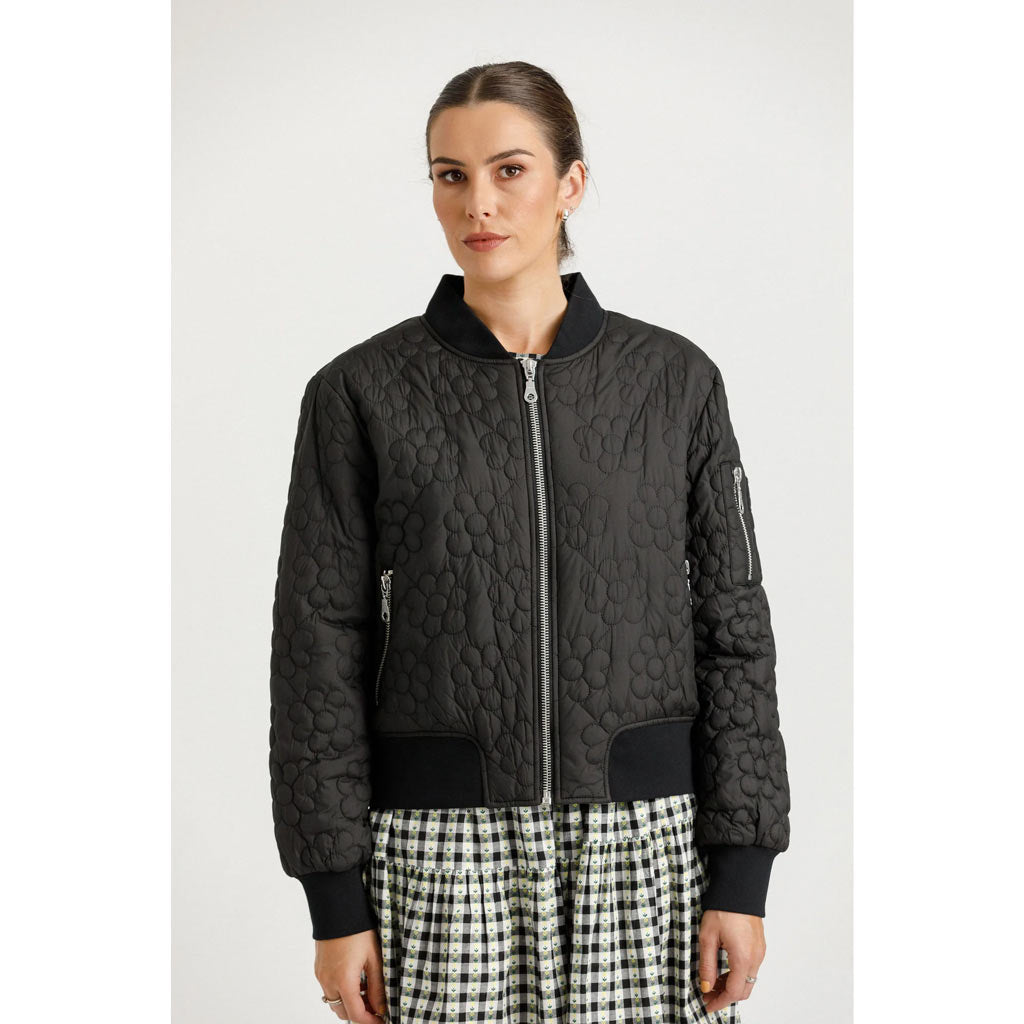 Thing Thing Flight Jacket - Black. Women's bomber jacket. Side and Arm Pockets. Floral Quilted Pattern. Zip Down Front. Ribbed Hem, Neckline and Cuffs. Shop new season women's Thing Thing online with Pavement. Free NZ shipping over $150 - Same day Dunedin delivery  - Easy returns.