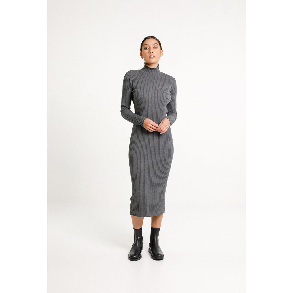 Thing Thing Turtle Neck Dress - Ash. In a warm and wearable weight, this dress features a ribbed slim fitting funnel neck, long sleeves and body. Shop Thing Thing winter '23 women's clothing and accessories. Free NZ shipping over $100. Pavement skate shop, Dunedin.