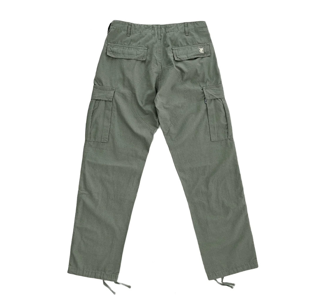 Vic Cargo Pants - Olive. Relaxed fit, low waist 100% Cotton Ripstop fabric. Double layer at knee.Slightly tapered leg. Drawstring cuffs. Shop Aotearoa's premium streetwear brand Vic online. Free, fast NZ shipping over $100. Buy now, pay later with Afterpay and Laybuy. Pavement, Ōtepoti's skate store, since 2009.