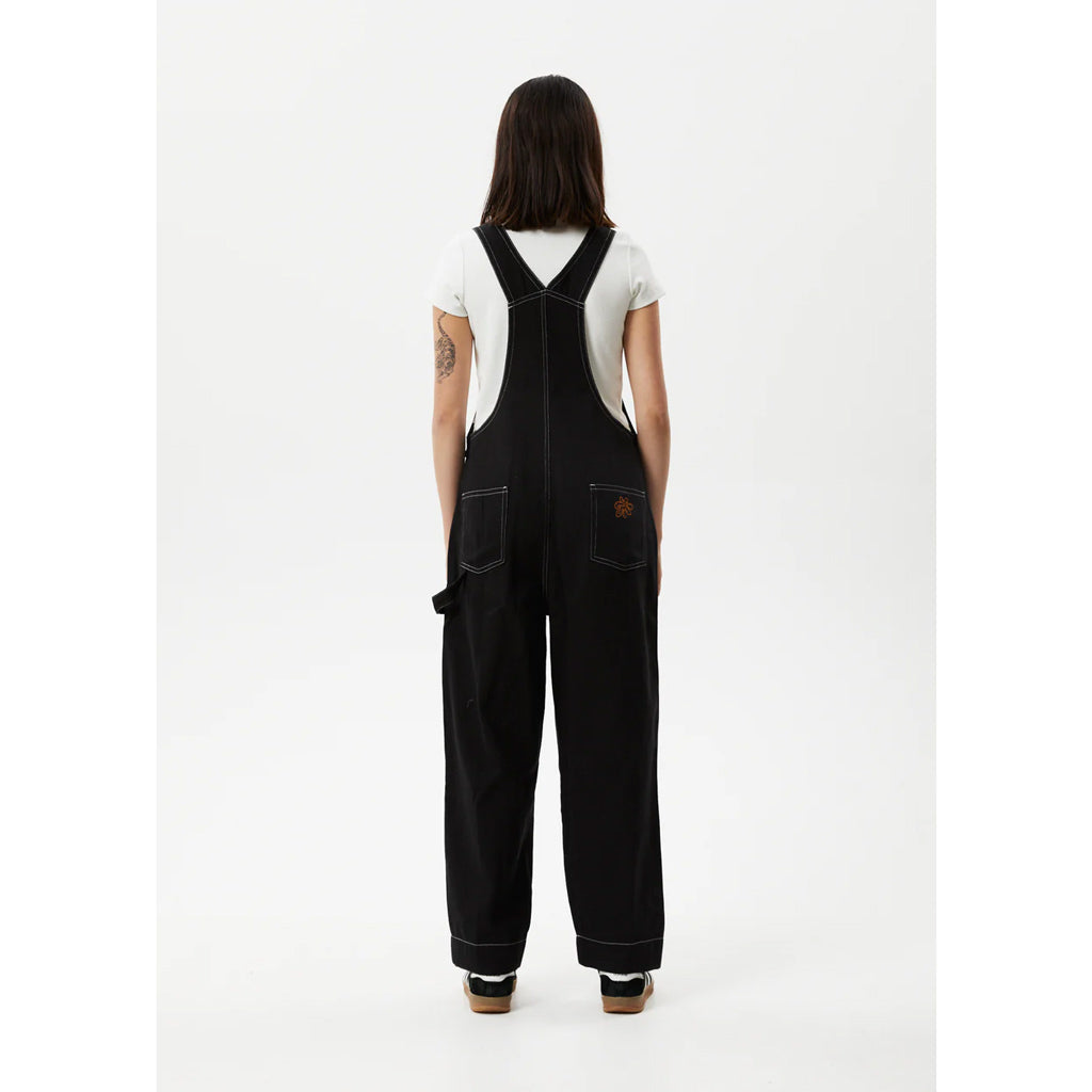 Afends Louis Organic Denim Baggy Overalls - Washed Black. Oversized Baggy Fit Overalls. Multiple Pockets. Adjustable Straps. Button-Up Sides 65% Organic Cotton - 35% Recycled Cotton Denim. Midweight, 8.5oz. Free NZ shipping. Shop Afends with Pavement skate store, Ōtepoti.