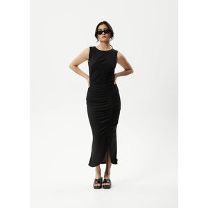 Afends Mirage Bamboo Sheer Maxi Dress - Black. Afends women's maxi dress featuring an adjustable gather detailing in a 2 x 2 rib creating some serious texture. Shop Afends women's clothing online with Pavement. Free NZ shipping over $150 - Same day Dunedin delivery - Easy returns.