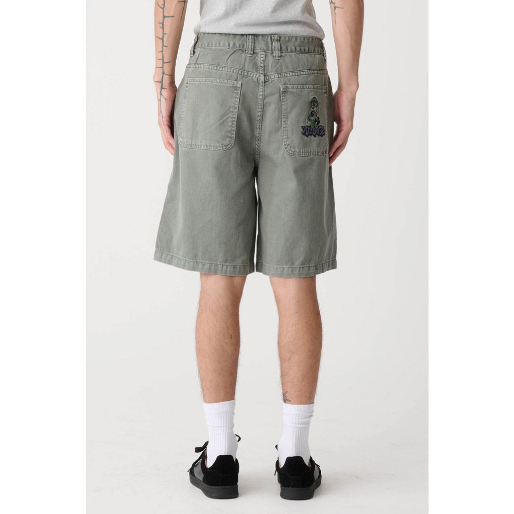 The XLarge Peace Man Bull Denim Short in Olive Grey is a fixed waist baggy fit. Features extra wide cut leg in a washed denim, they have an oversized waist with an extended rise, roomy thigh, and slightly tapered cuff. Shop XLarge clothing online with Pavement and enjoy free NZ shipping over $150.