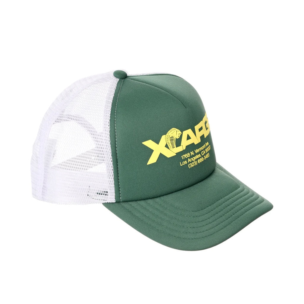 Xlarge LA Vipers Trucker Hat - Forest Green. The LA Vipers Trucker Cap is a regular one size fits all.  Screen printed graphic. Mesh back panels. Snapback closure. XLarge flag label at back. 100% Polyester. Shop caps from Xlarge, Butter Goods, Pass~Port, Carhartt WIP and Polar online with Pavement, Dunedin skate store.