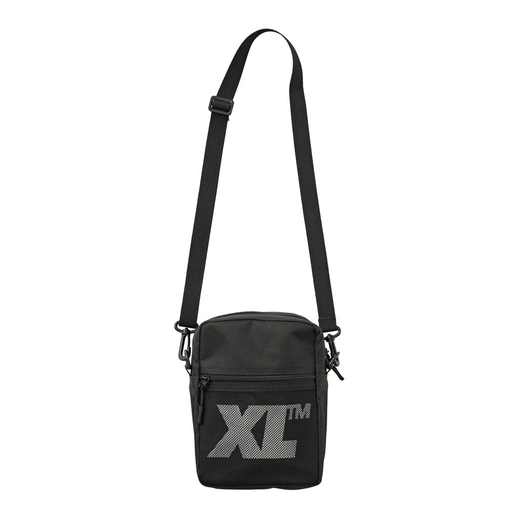 Xlarge XL Utility Bag - Black. Messenger mini bag, suitable for all weather. 100% Nylon Heavy Canvas. Mesh front pocket. Water resistant. Heavy adjustable webbing strap. YKK zip opening. Shop Xlarge accessories online with Pavement skate store. Free NZ shipping over $150. Easy returns.