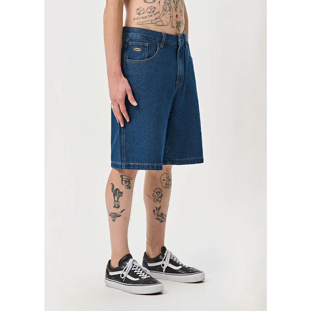 XLarge Bull Denim 91 Short - Blue Denim. The Bull Denim 91 Shorts are loose fitting shorts with a fixed waist with belt loops. Made from 100% cotton bull denim and have a 5 pocket construction. Shop the iconic XLarge 91 collection of denim, tees, hoods and shirts. Free NZ shipping over $100. Pavement, Dunedin Skate.