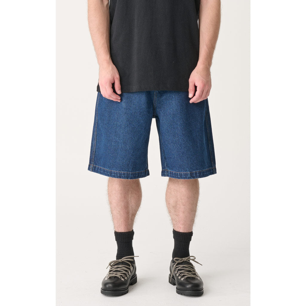 Xlarge Burst Bull Denim 91 Short in Raw Indigo | Shop Xlarge clothing online with Pavement Skate Store with free Aotearoa NZ shipping on orders over $100*
